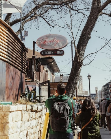 Street scene outside a kitchen and bar in downtown Austin