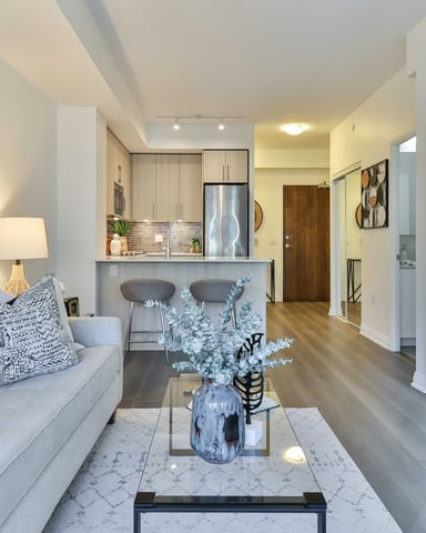 Bright open-plan living room with kitchen island and modern finishes