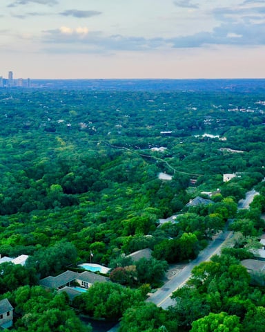Aerial of Lake Travis with green hills